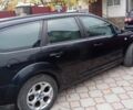 Черный Форд Фокус, объемом двигателя 1.6 л и пробегом 250 тыс. км за 4700 $, фото 3 на Automoto.ua