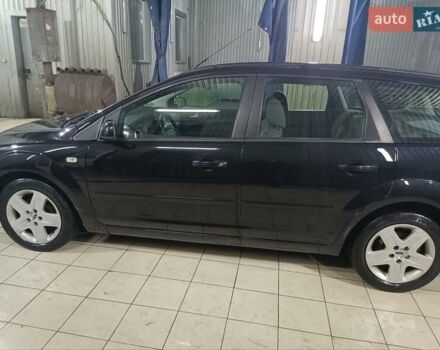 Черный Форд Фокус, объемом двигателя 1.6 л и пробегом 283 тыс. км за 4550 $, фото 3 на Automoto.ua