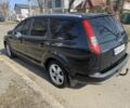 Черный Форд Фокус, объемом двигателя 1.6 л и пробегом 230 тыс. км за 4400 $, фото 1 на Automoto.ua
