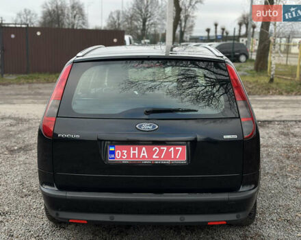 Черный Форд Фокус, объемом двигателя 1.8 л и пробегом 188 тыс. км за 5600 $, фото 13 на Automoto.ua