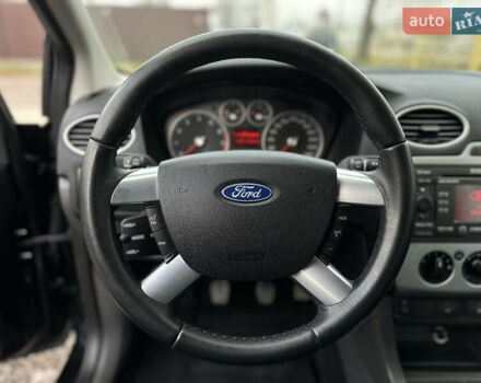 Черный Форд Фокус, объемом двигателя 1.8 л и пробегом 188 тыс. км за 5600 $, фото 26 на Automoto.ua