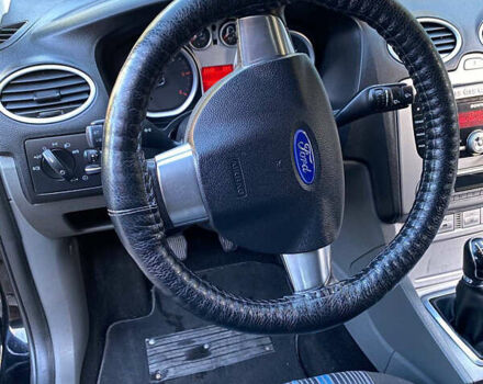 Черный Форд Фокус, объемом двигателя 1.56 л и пробегом 223 тыс. км за 4550 $, фото 13 на Automoto.ua