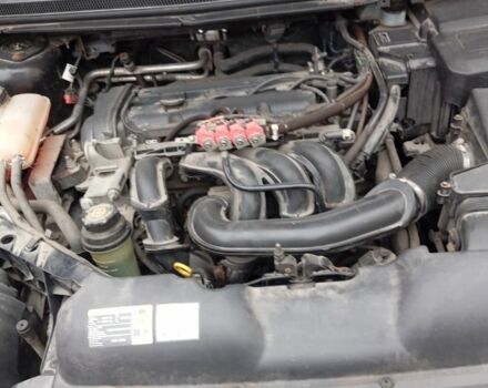 Черный Форд Фокус, объемом двигателя 1.6 л и пробегом 250 тыс. км за 4700 $, фото 4 на Automoto.ua