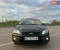 Черный Форд Фокус, объемом двигателя 1.6 л и пробегом 260 тыс. км за 4600 $, фото 1 на Automoto.ua