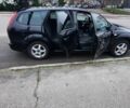 Черный Форд Фокус, объемом двигателя 1.6 л и пробегом 300 тыс. км за 4730 $, фото 2 на Automoto.ua