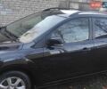 Черный Форд Фокус, объемом двигателя 1.6 л и пробегом 280 тыс. км за 5200 $, фото 6 на Automoto.ua