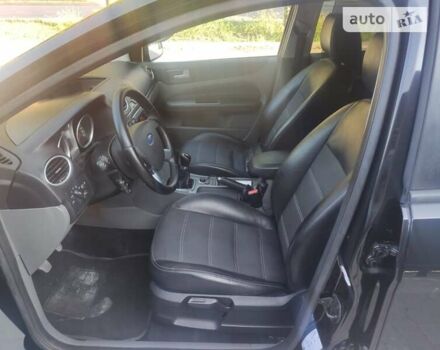 Черный Форд Фокус, объемом двигателя 1.8 л и пробегом 234 тыс. км за 5750 $, фото 1 на Automoto.ua