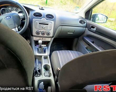 Форд Фокус 2008 у Кельменцах на Automoto.ua Чорний Форд Фокус, об'ємом двигуна 1.6 л та пробігом 208 тис. км за 5800 $, фото 5 на Automoto.ua