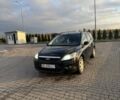Черный Форд Фокус, объемом двигателя 1.8 л и пробегом 230 тыс. км за 4500 $, фото 2 на Automoto.ua