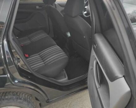 Черный Форд Фокус, объемом двигателя 1.6 л и пробегом 251 тыс. км за 5499 $, фото 11 на Automoto.ua