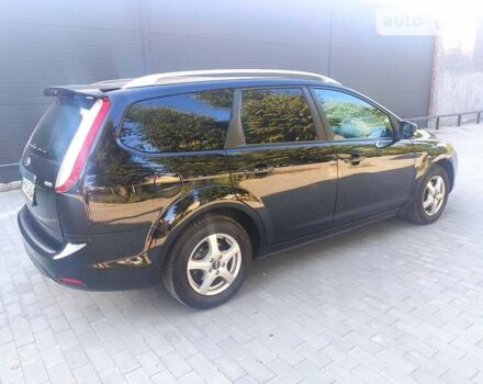 Черный Форд Фокус, объемом двигателя 1.8 л и пробегом 234 тыс. км за 5750 $, фото 4 на Automoto.ua