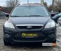 Черный Форд Фокус, объемом двигателя 1.6 л и пробегом 201 тыс. км за 5999 $, фото 1 на Automoto.ua