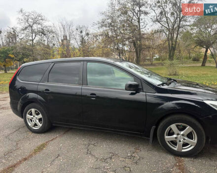 Черный Форд Фокус, объемом двигателя 1.8 л и пробегом 160 тыс. км за 5700 $, фото 3 на Automoto.ua