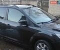 Черный Форд Фокус, объемом двигателя 1.6 л и пробегом 280 тыс. км за 5200 $, фото 1 на Automoto.ua