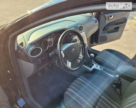 Черный Форд Фокус, объемом двигателя 1.6 л и пробегом 212 тыс. км за 5700 $, фото 17 на Automoto.ua