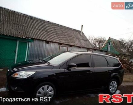 Черный Форд Фокус, объемом двигателя 2 л и пробегом 240 тыс. км за 5700 $, фото 1 на Automoto.ua