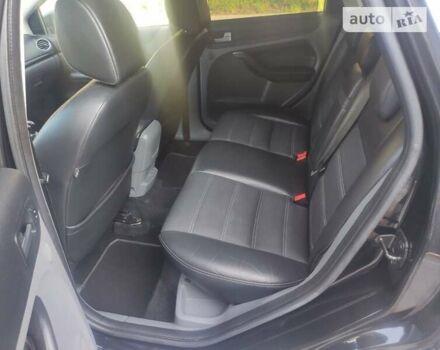 Черный Форд Фокус, объемом двигателя 1.8 л и пробегом 234 тыс. км за 5750 $, фото 6 на Automoto.ua