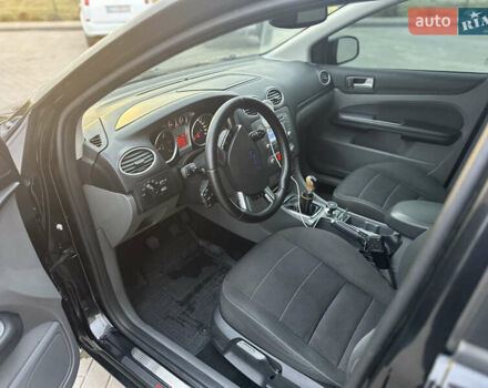 Черный Форд Фокус, объемом двигателя 1.56 л и пробегом 290 тыс. км за 5750 $, фото 9 на Automoto.ua