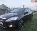 Черный Форд Фокус, объемом двигателя 1.6 л и пробегом 252 тыс. км за 5100 $, фото 1 на Automoto.ua