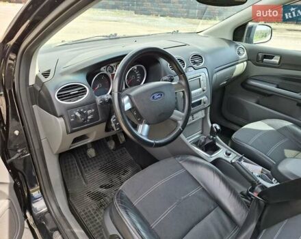 Черный Форд Фокус, объемом двигателя 1.56 л и пробегом 245 тыс. км за 5400 $, фото 10 на Automoto.ua