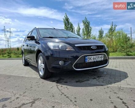 Черный Форд Фокус, объемом двигателя 1.56 л и пробегом 245 тыс. км за 5400 $, фото 7 на Automoto.ua