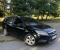 Чорний Форд Фокус, об'ємом двигуна 2 л та пробігом 310 тис. км за 5800 $, фото 1 на Automoto.ua