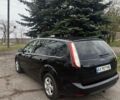 Черный Форд Фокус, объемом двигателя 1.8 л и пробегом 257 тыс. км за 4999 $, фото 7 на Automoto.ua