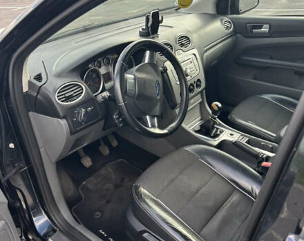 Черный Форд Фокус, объемом двигателя 1.6 л и пробегом 247 тыс. км за 4500 $, фото 4 на Automoto.ua