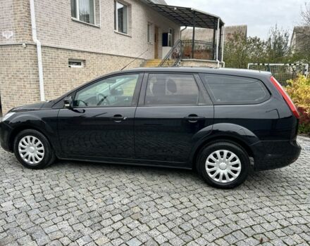 Черный Форд Фокус, объемом двигателя 1.6 л и пробегом 200 тыс. км за 5500 $, фото 7 на Automoto.ua