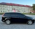 Черный Форд Фокус, объемом двигателя 1.8 л и пробегом 218 тыс. км за 4999 $, фото 6 на Automoto.ua