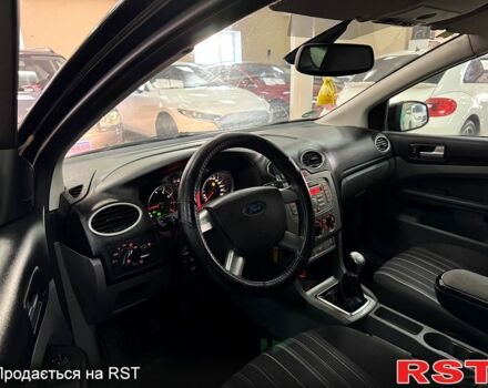 Черный Форд Фокус, объемом двигателя 1.8 л и пробегом 19300 тыс. км за 5400 $, фото 6 на Automoto.ua