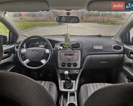 Черный Форд Фокус, объемом двигателя 1.8 л и пробегом 300 тыс. км за 5900 $, фото 12 на Automoto.ua