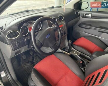 Черный Форд Фокус, объемом двигателя 1.6 л и пробегом 257 тыс. км за 6400 $, фото 16 на Automoto.ua