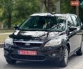 Черный Форд Фокус, объемом двигателя 1.6 л и пробегом 212 тыс. км за 4999 $, фото 2 на Automoto.ua