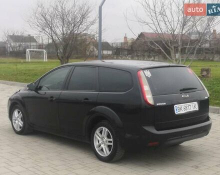 Черный Форд Фокус, объемом двигателя 1.8 л и пробегом 300 тыс. км за 5900 $, фото 5 на Automoto.ua