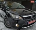 Черный Форд Фокус, объемом двигателя 1.6 л и пробегом 160 тыс. км за 5799 $, фото 1 на Automoto.ua