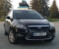 Черный Форд Фокус, объемом двигателя 1.6 л и пробегом 247 тыс. км за 5900 $, фото 1 на Automoto.ua