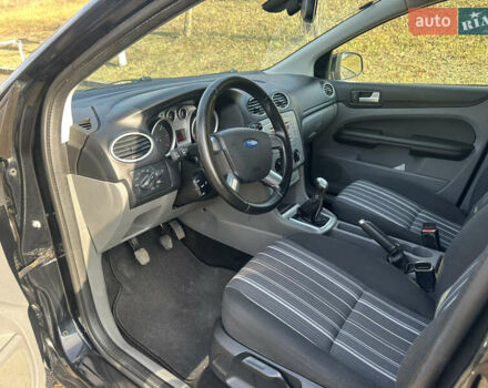 Черный Форд Фокус, объемом двигателя 1.56 л и пробегом 240 тыс. км за 6350 $, фото 19 на Automoto.ua