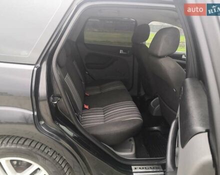 Черный Форд Фокус, объемом двигателя 1.8 л и пробегом 300 тыс. км за 5900 $, фото 11 на Automoto.ua