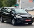 Черный Форд Фокус, объемом двигателя 1.6 л и пробегом 212 тыс. км за 4999 $, фото 1 на Automoto.ua