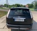 Черный Форд Фокус, объемом двигателя 1.8 л и пробегом 315 тыс. км за 5000 $, фото 2 на Automoto.ua