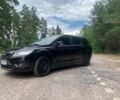Чорний Форд Фокус, об'ємом двигуна 2 л та пробігом 231 тис. км за 4800 $, фото 2 на Automoto.ua