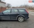 Черный Форд Фокус, объемом двигателя 1.6 л и пробегом 300 тыс. км за 4200 $, фото 1 на Automoto.ua