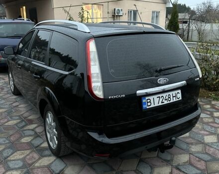 Черный Форд Фокус, объемом двигателя 1.6 л и пробегом 235 тыс. км за 5350 $, фото 1 на Automoto.ua