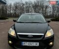 Черный Форд Фокус, объемом двигателя 1.6 л и пробегом 230 тыс. км за 5800 $, фото 1 на Automoto.ua