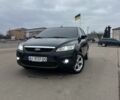 Черный Форд Фокус, объемом двигателя 1.8 л и пробегом 290 тыс. км за 6100 $, фото 1 на Automoto.ua