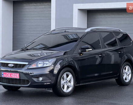 Черный Форд Фокус, объемом двигателя 1.8 л и пробегом 218 тыс. км за 5799 $, фото 11 на Automoto.ua