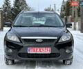 Черный Форд Фокус, объемом двигателя 1.8 л и пробегом 210 тыс. км за 5450 $, фото 10 на Automoto.ua