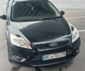 Черный Форд Фокус, объемом двигателя 1.56 л и пробегом 240 тыс. км за 5400 $, фото 1 на Automoto.ua