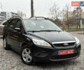 Черный Форд Фокус, объемом двигателя 1.6 л и пробегом 233 тыс. км за 5800 $, фото 1 на Automoto.ua